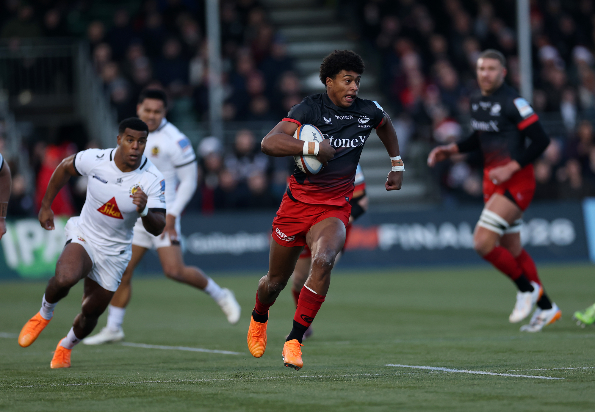 Saracens' Noah Caluori runs with the ball during his team's December 2025 match against Exeter Chiefs