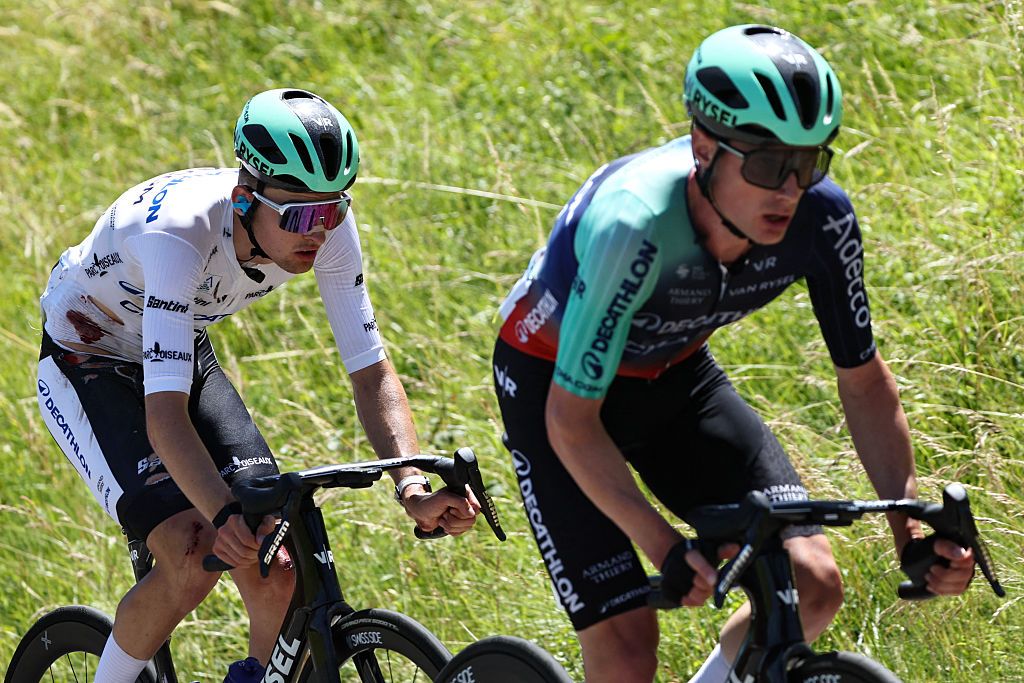 Decathlon CMA CGM Team's French rider Paul Seixas wearing the best young rider's white jersey cycles during the 7th stage of the Tour Auvergne-Rhone-Alpes cycling race (formerly known as the Criterium du Dauphine), 133,6km between La Bridoire and Grand Colombier in the French Alps on June 13, 2026. (Photo by Anne-Christine POUJOULAT / AFP)